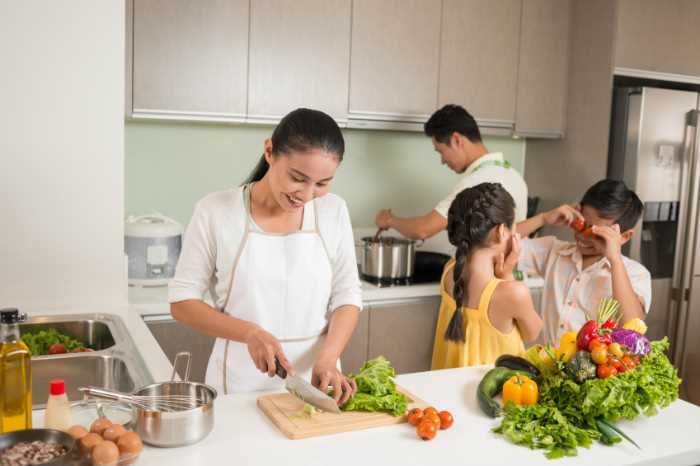 A family preparing a meal together